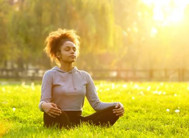 woman enjoying sounds of nature for mental health